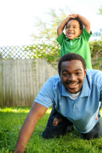 Dad & Son Playing