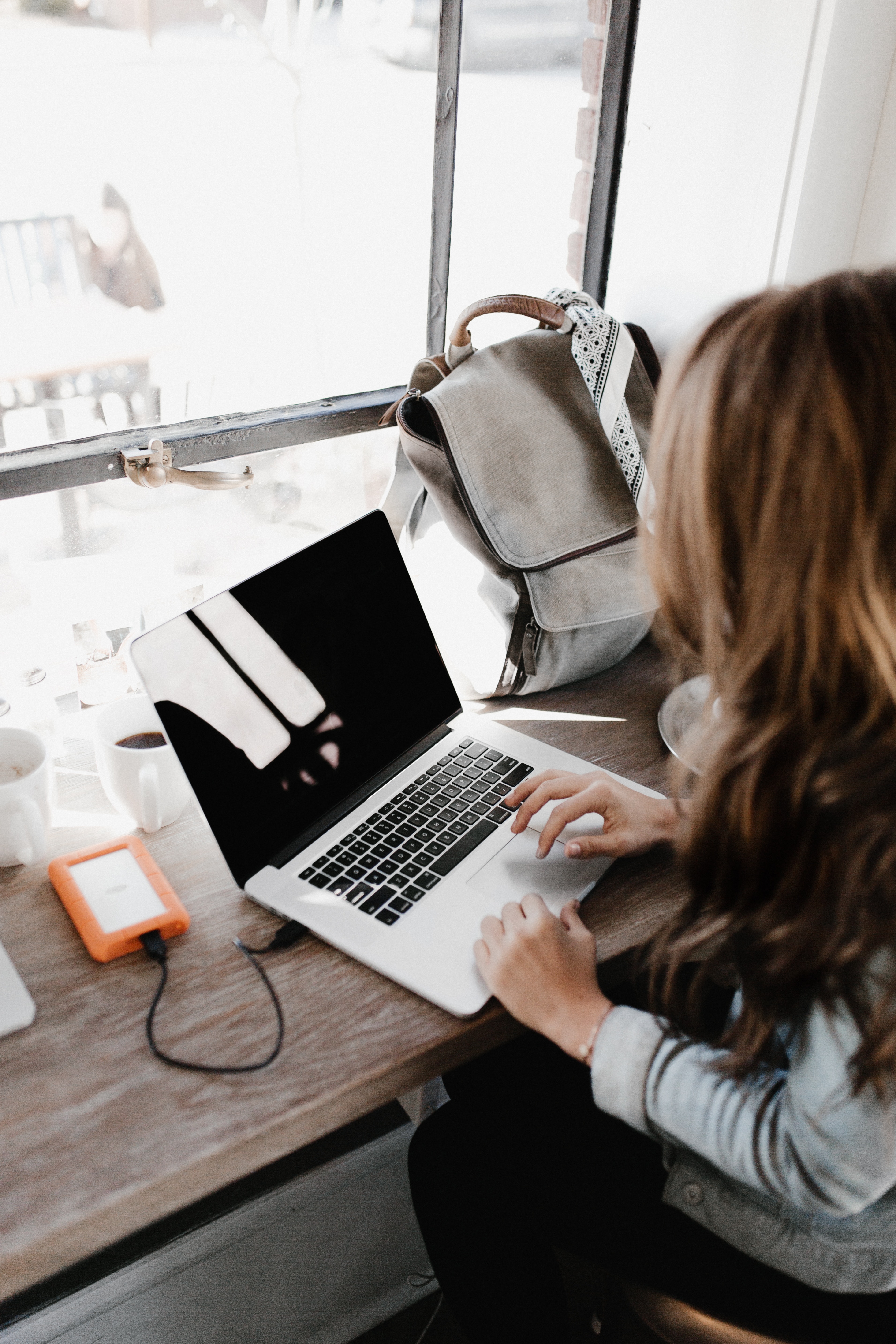girl studying at her desk on a laptop