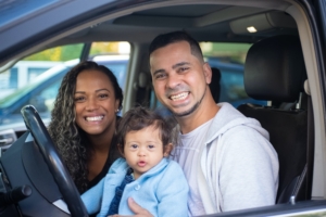 family in car